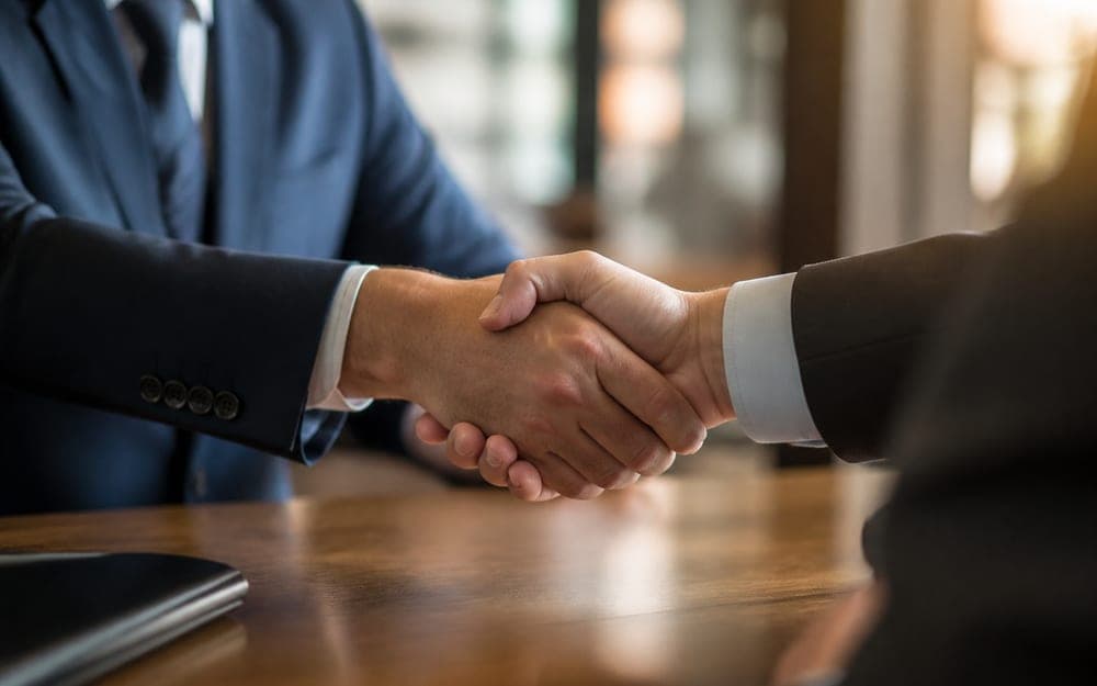Business handshake between partners